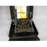 Early 20th Century Corona folding portable typewriter in original fitted case