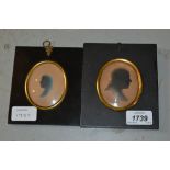 Two 19th Century oval silhouette portrait pictures of gentlemen housed in rectangular papier mache