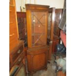 Reproduction mahogany standing corner cabinet with an astragal glazed door above a panelled door