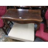 19th Century serpentine fronted rosewood card table with fold-over top and baize lined interior,