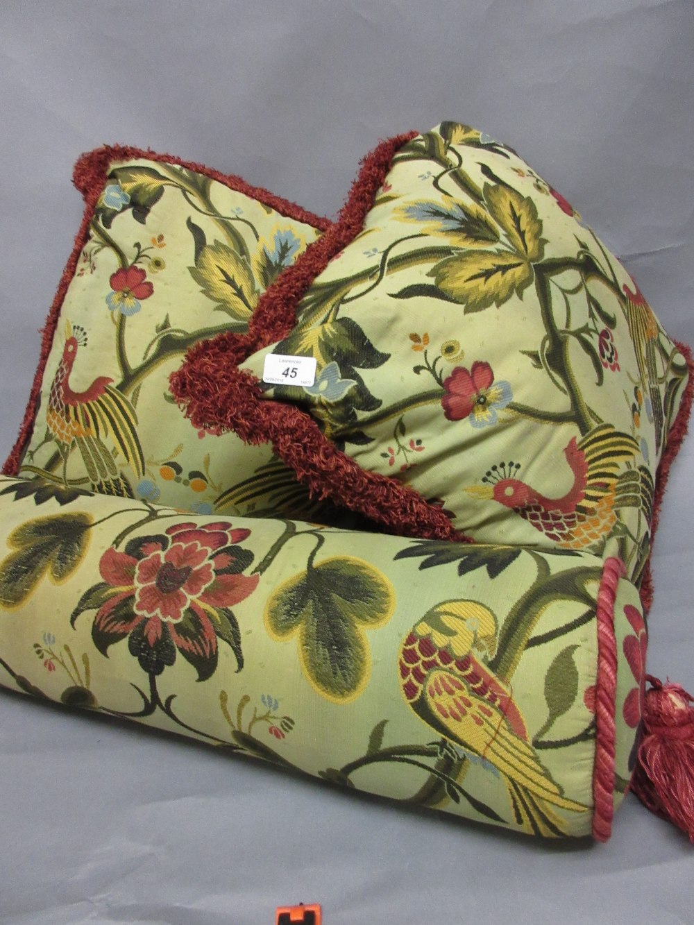 Quantity of cushions and two bolster cushions upholstered in G.P. and J.