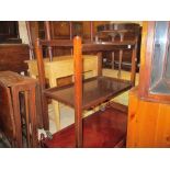 Mahogany two tier tea trolley, composition wall mirror,