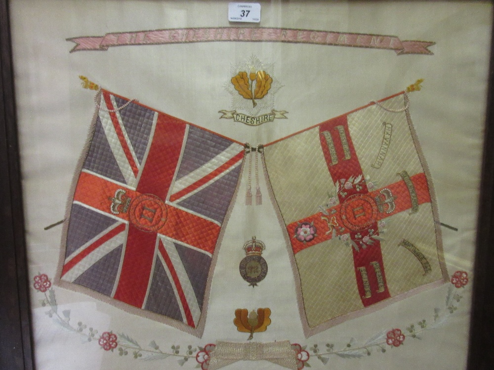 Early 20th Century silkwork regimental coat of arms for the Cheshire Regiment, 20ins x 23ins,