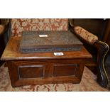 Indian hardwood box with pierced cover together with an oriental hardwood box carved with a figure