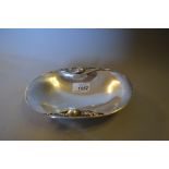 Georg Jensen, silver bonbon dish of oval stylised form decorated with flower heads,
