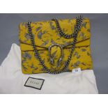 Gucci Dionysus Arabesque shoulder bag with sliding chain strap and tiger head spur closure,