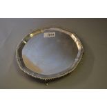 Circular 20th Century Birmingham silver letter salver on four hoof feet,