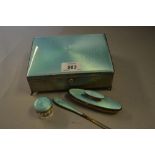 Good quality rectangular silver and translucent enamel dressing table box with three matching