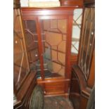 Mid 20th Century mahogany corner cabinet with two astragal glazed doors above a pair of panel doors