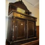 Small Victorian chiffonier with a mirrored shelf back above a single drawer and two cupboard doors