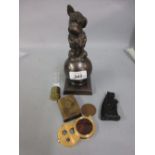 Patinated spelter table lighter mounted with a figure of a dog,