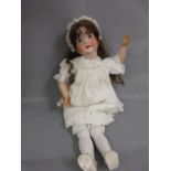 Heubach Koppelsdorf, German 30in bisque headed doll with fixed brown eyes,