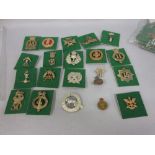 Collection of twenty various military badges