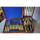 Walnut cased set of silver plated dessert knives and forks,