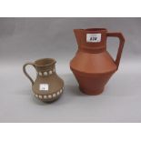 Watcombe pottery terracotta jug after a Christopher Dresser design together with a Wedgwood