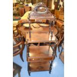 Victorian walnut and marquetry inlaid graduated four tier whatnot with an oval bevelled mirror