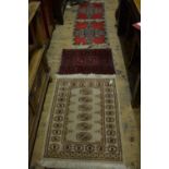 Small Pakistan Bokhara design rug with beige ground,