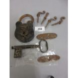 Unusual 19th Century steel key with sprung cap,