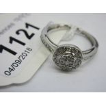 9ct White gold halo style ring of approximately 0.