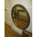 Large modern oval gilded and green painted wall mirror