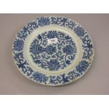 Chinese Kangxi blue and white plate decorated with an all-over stylised floral design,