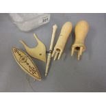 Group of five early ivory needlework items, a tambour hook, lucet,