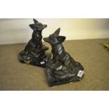 Pair of Art Deco dark patinated spelter bookends in the form of foxes on marble bases