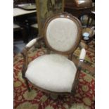 20th Century French carved beechwood open armchair with cream damask upholstery