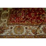 Red ground Kashan pattern machine carpet, 2.3m x 1.
