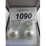 Pair of 18ct white gold South Sea peal and diamond drop earrings,