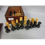 Boxwood and ebony weighted chess set in a mahogany case CONDITION REPORT King is 9cm