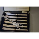 Cased set of six silver handled tea knives,