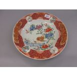 Japanese circular kutani wall plate painted with bird in foliage