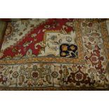 Beige ground Heriz pattern machine woven carpet, 2.30m x 1.