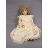 Reproduction Kestner 20in bisque headed doll with jointed body