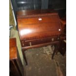 Reproduction mahogany bureau with a bow fall front above single drawer,