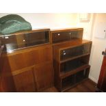 Group of three Minty oak bookcases of various sizes,