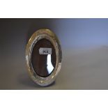 Oval silver mounted photograph frame (at fault)