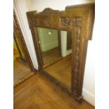 Large gilded moulded composition wall mirror,