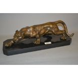 Brown patinated bronze figure of a stalking panther,