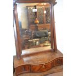 George III mahogany swing frame toilet mirror with a fretwork surmount and three drawer serpentine