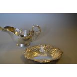 Oval London silver pierced trinket dish together with a silver spoon,