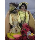 Two composition and fabric dolls with hand made clothing