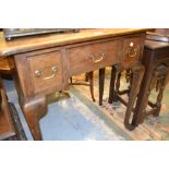 19th Century oak lowboy with three drawers on cabriole supports with pad feet