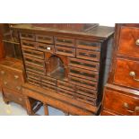 18th Century Continental walnut cabinet on stand with multiple drawers and alcove,