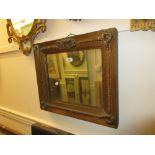 Victorian rectangular gilt framed wall mirror with a rope pattern border,