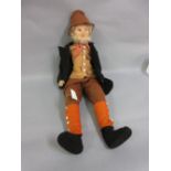 Large Norah Wellings doll of a bearded gentleman in a suit with hat and boots