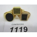 Two 18ct gold signet rings together with a 9ct gold signet ring CONDITION REPORT 1.