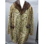 Ladies half length ocelot jacket together with a wool jacket with ocelot collar