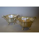 White metal cream jug with matching two handled sugar bowl